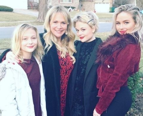 Emily Alyn Lind with her mother and sisters